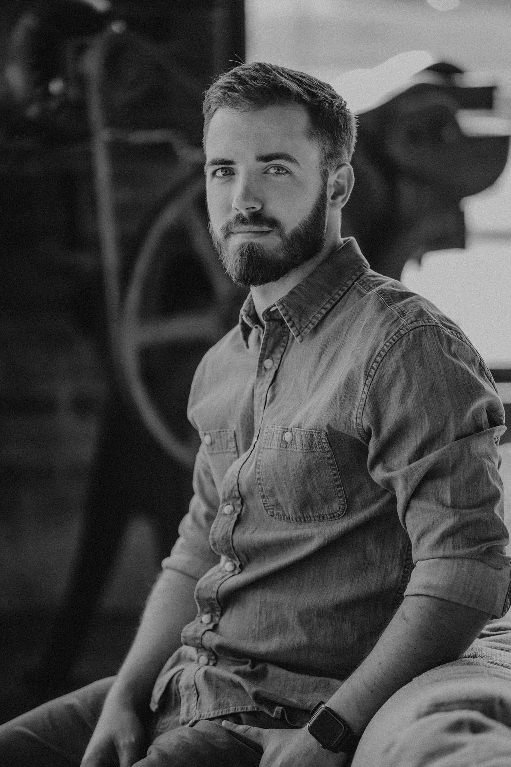 Travis McCullough seated, in conversation